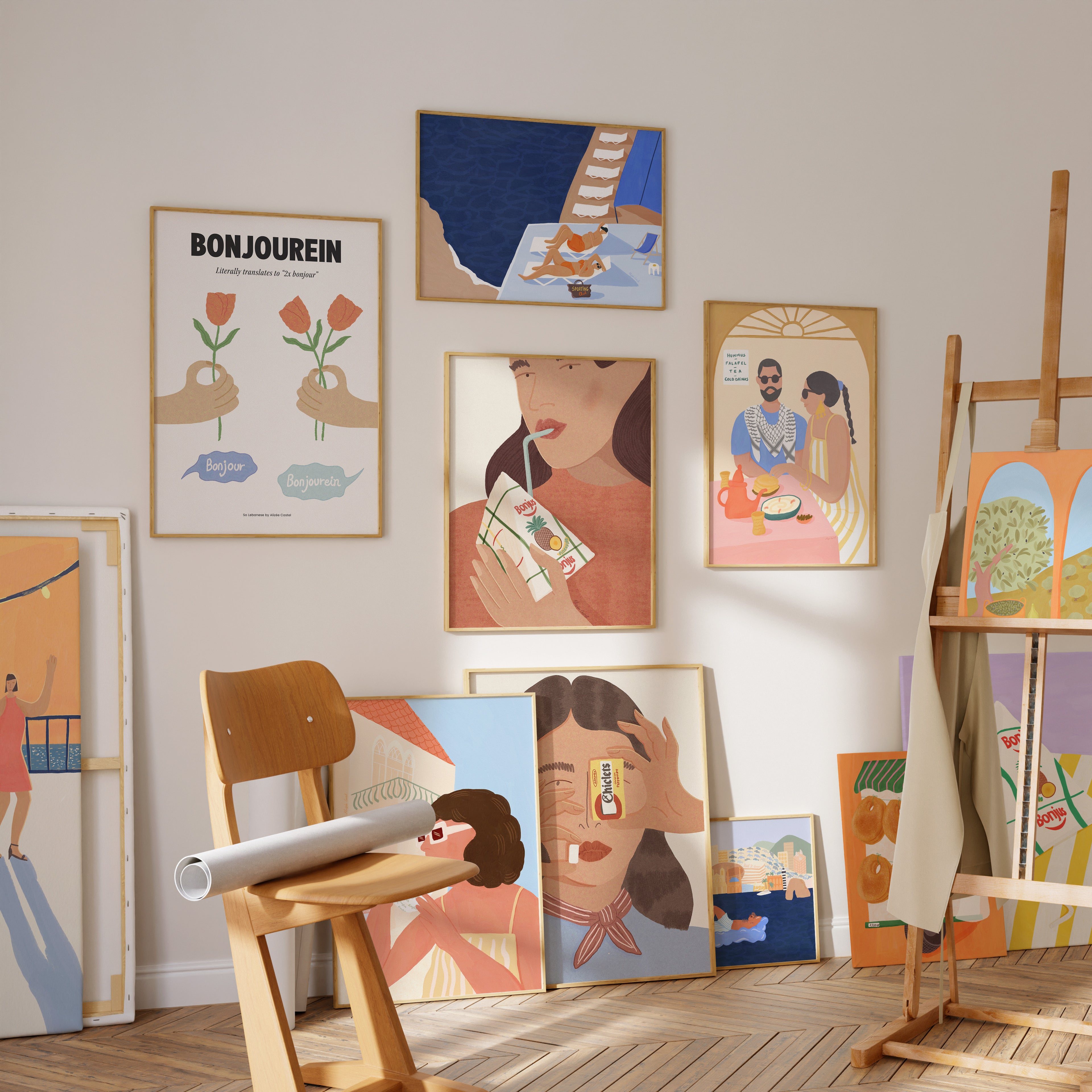 Picture of Alizee Castel's art studio with framed Levantine prints hanging on the wall